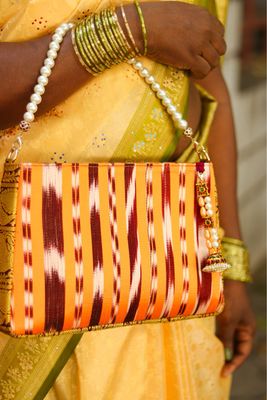 Kanakambara Handbag