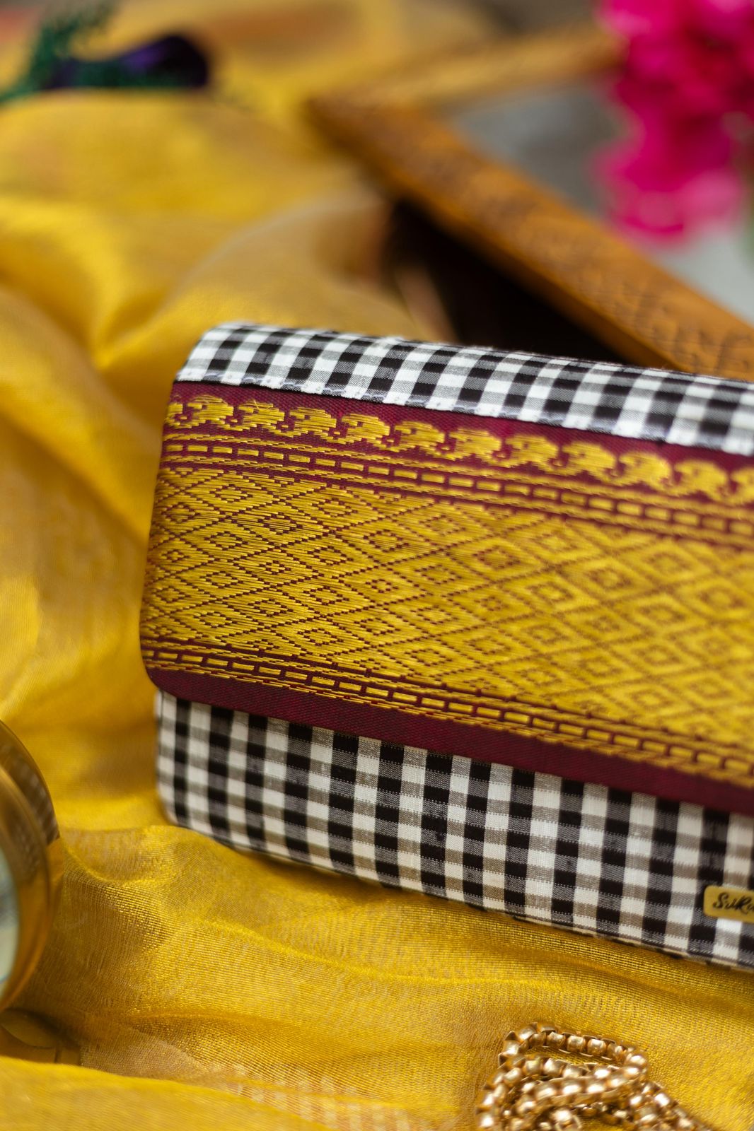 Black and white with Maroon Aaraku