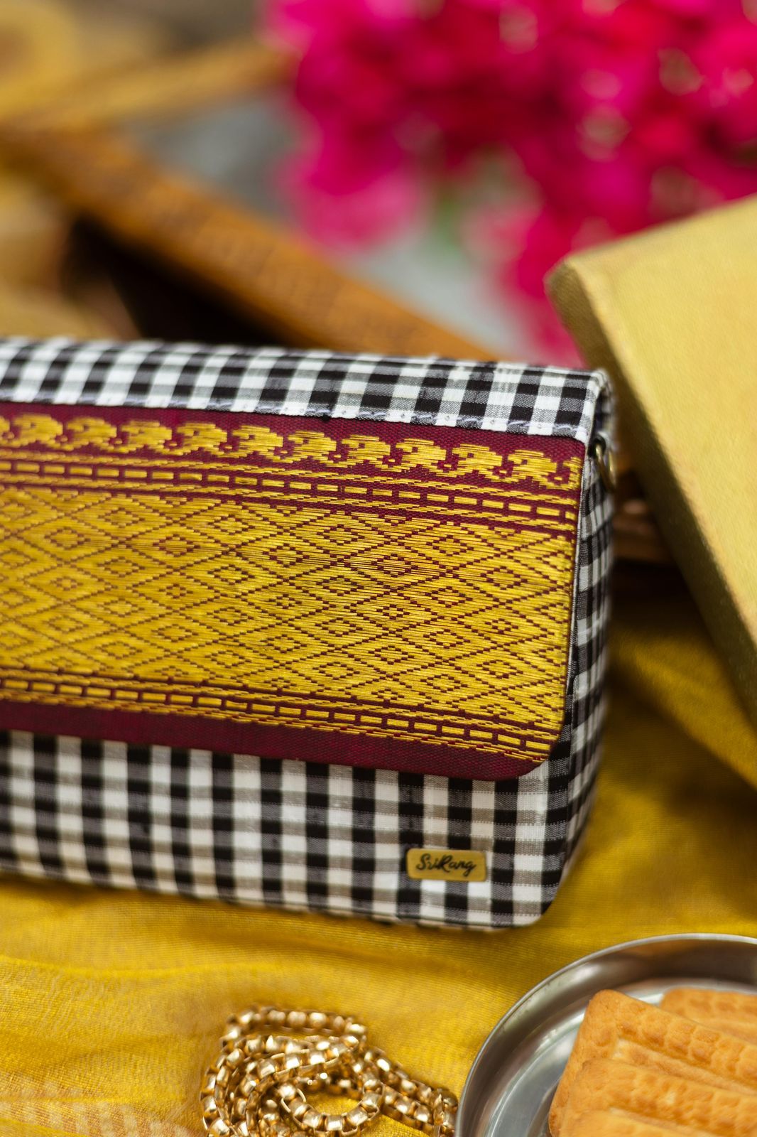 Black and white with Maroon Aaraku