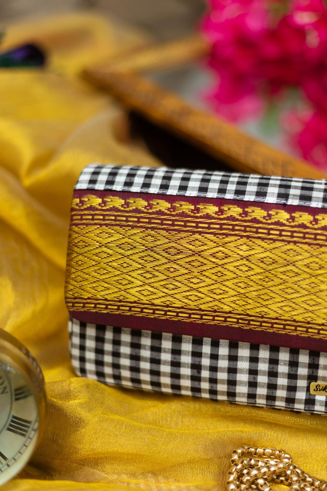 Black and white with Maroon Aaraku