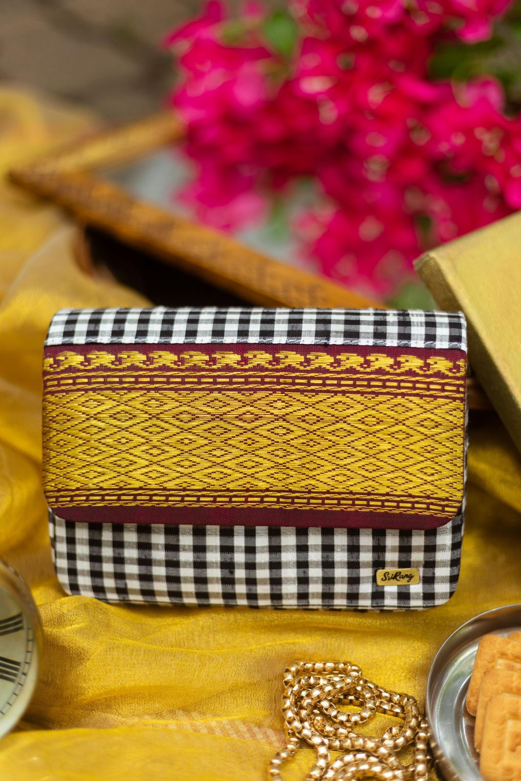 Black and white with Maroon Aaraku