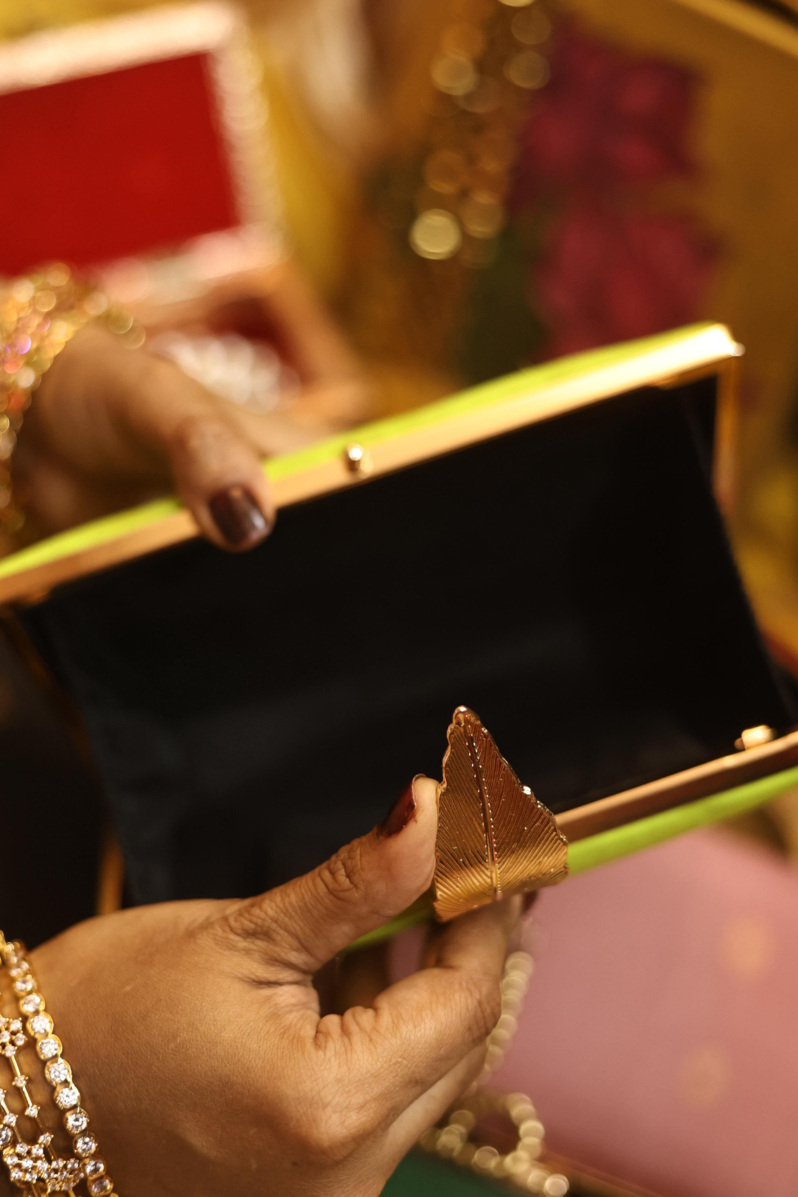 Neon green feather🪶