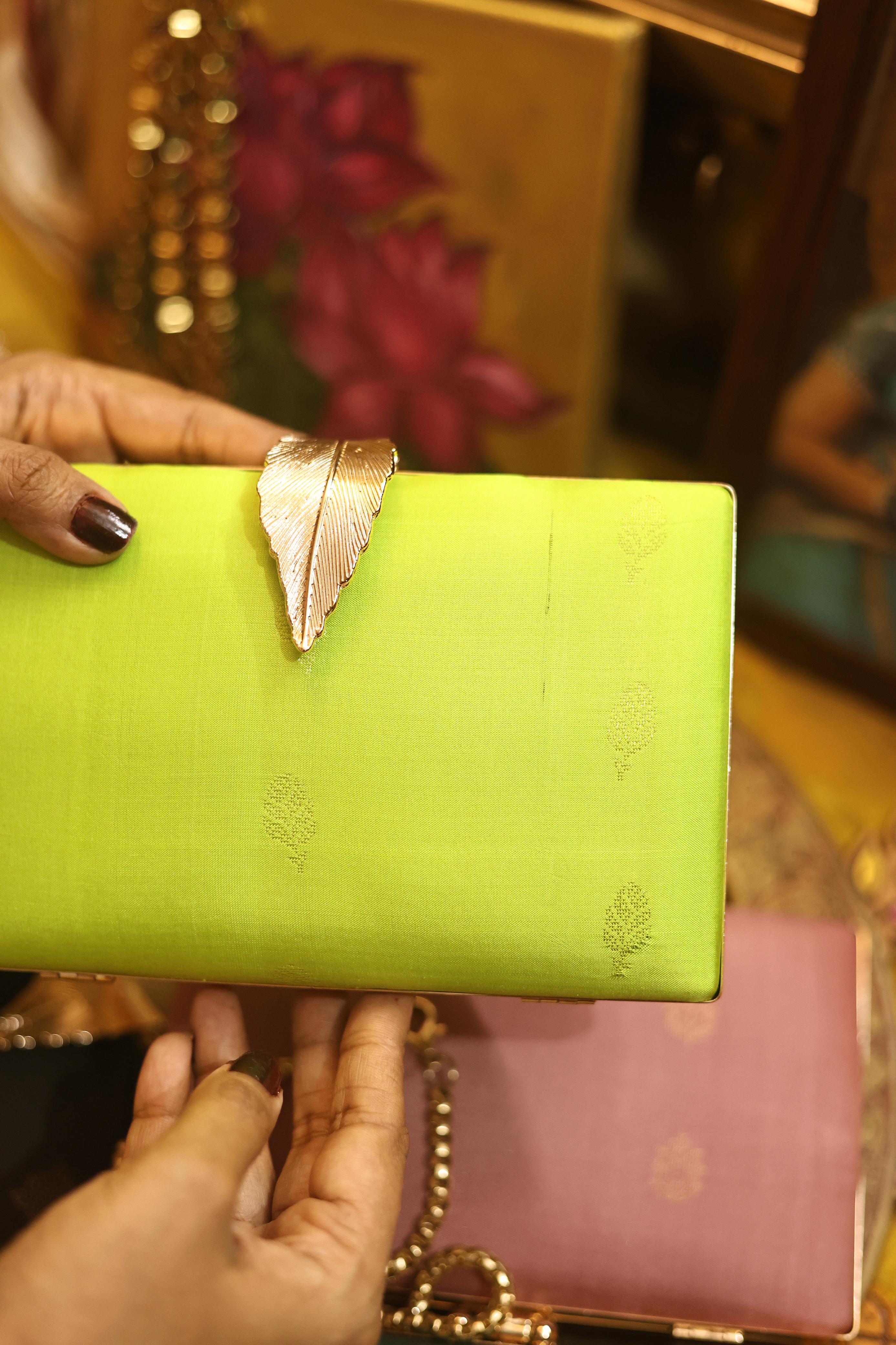 Neon green feather🪶